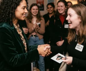 Artist and fans at a meet-and-greet